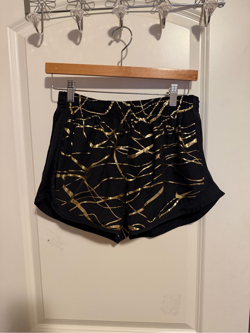 Nike Black Athletic Dri-Fit Shorts with Gold Wave Detail